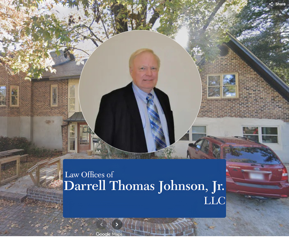 Portrait of an attorney above the Law Offices of Darrell Thomas Johnson, Jr. LLC logo with a brick office building background.